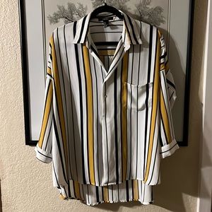 Forever 21 Blouse in Size Small but it is definitely oversized.